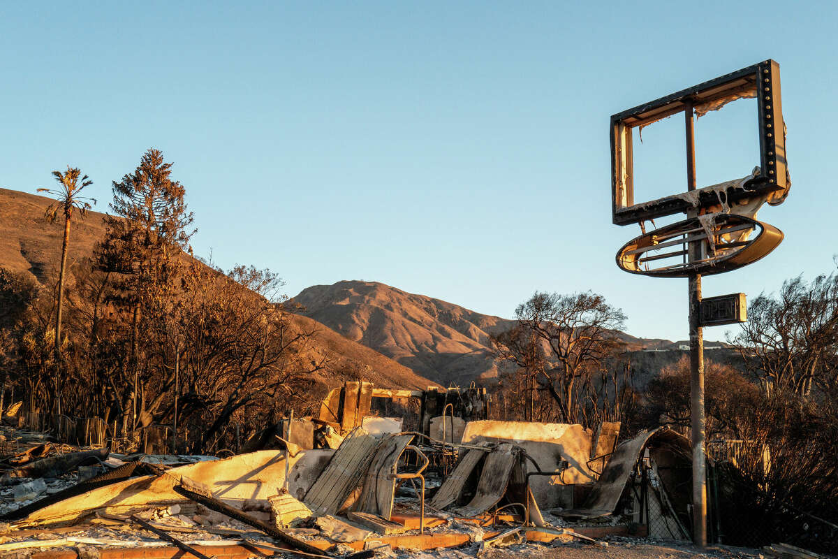 The remains of a restaurant destroyed by the Palisades wildfire is seen on January 13, 2025 in Malibu, California. Multiple wildfires fueled by intense Santa Ana Winds are burning across Los Angeles County. Reportedly at least 24 people have died with over 180,000 people under evacuation orders. Over 12,000 structures have been destroyed or damaged, while more than 35,000 acres have burned.