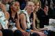 UConn's Azzi Fudd, left, and Paige Bueckers, center, watch during the first half of an NCAA women's college basketball game against St. John's, Wednesday, Jan. 15, 2025, in New York. (AP Photo/Frank Franklin II)