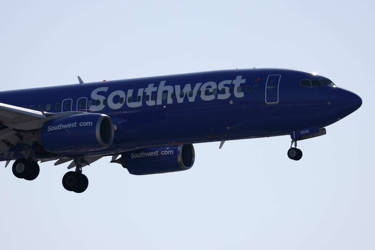 A Southwest Airlines Boeing 737 approaches San Diego International Airport for a landing from Tucson on December 20, 2024 in San Diego, California. 