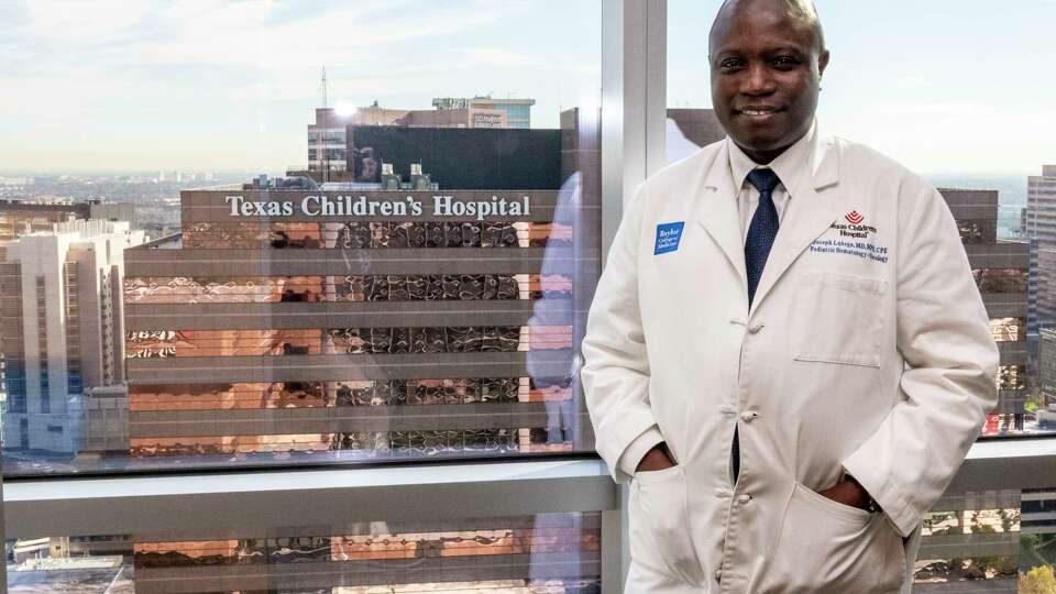 Dr. Joseph Lubega, associate professor at Baylor College of Medicine and director of Texas Children's Global HOPE Program, is photographed Thursday, Jan. 16, 2025 at Texas Children's hospital in the Houston Medical Center.