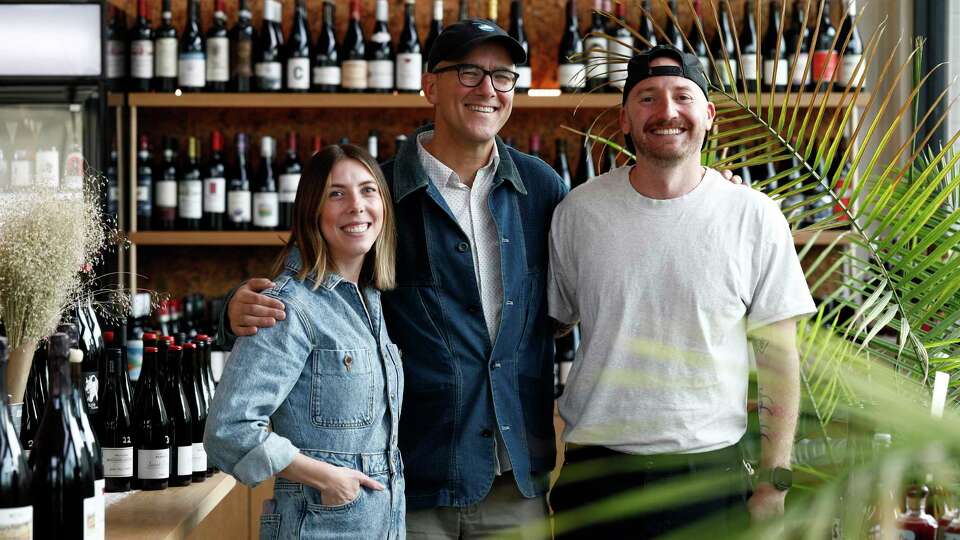 From left: Katie Plack, Dan Polsby and Sean Danzeiser at Best Friends wine bar and bottle shop in Albany, Calif., on Wednesday, Dec. 11, 2024.