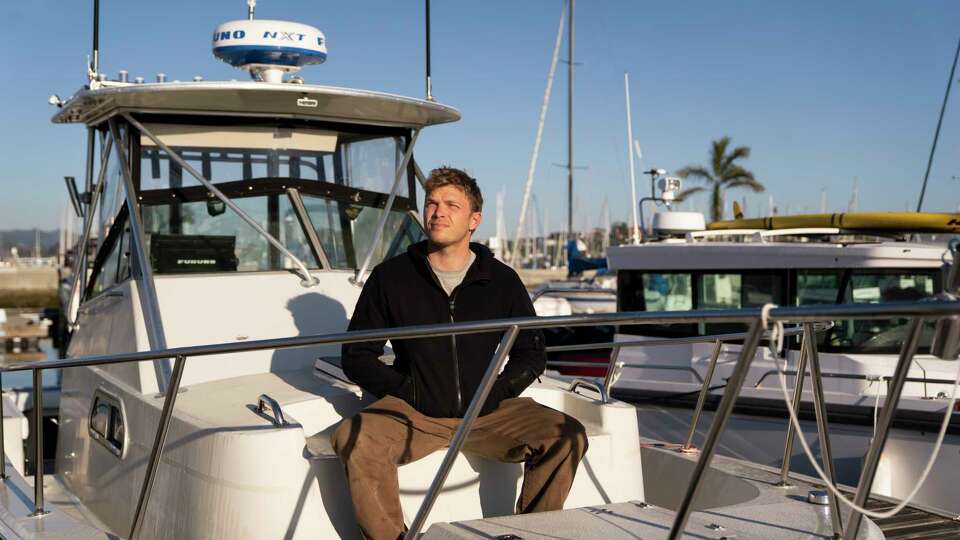 Roman Lewett poses for a portrait on his boat at Clipper Yacht Harbor in Sausalito, Calif., Thursday, Jan. 16, 2025. Lewett unintentionally found a piece of a shipwreck from the ocean floor back in 2018.