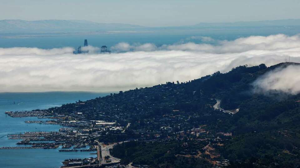 A view from Mt. Tam shows fog covering the sky in Marin County, Calif. on Wednesday, August 14, 2024.