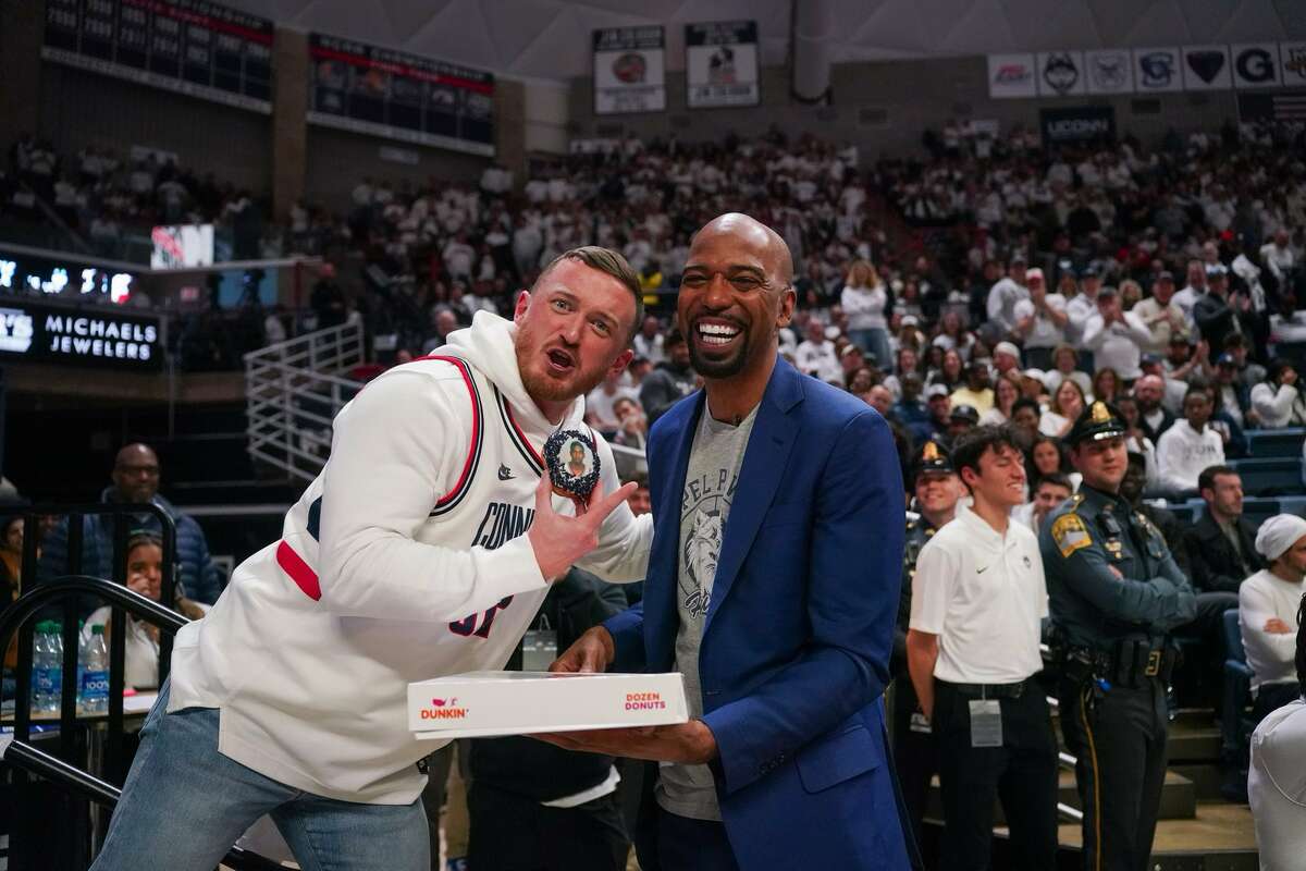 Meet ‘Little Red,’ the UConn superfan who travels to road games to ‘go nuts’ for his Huskies