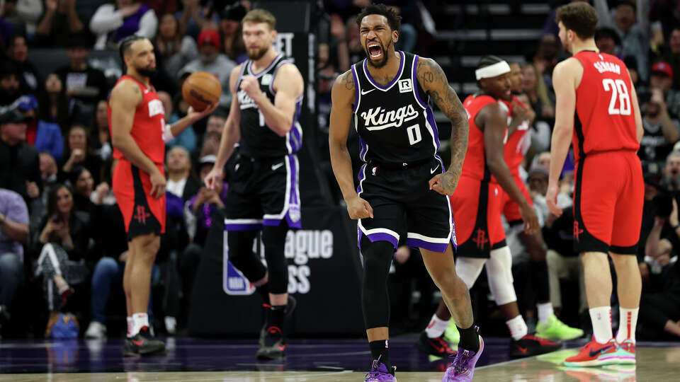 Malik Monk #0 of the Sacramento Kings reacts after Domantas Sabonis #11 made a basket and was fouled by the Houston Rockets in the first half at Golden 1 Center on January 16, 2025 in Sacramento, California. (Photo by Ezra Shaw/Getty Images)