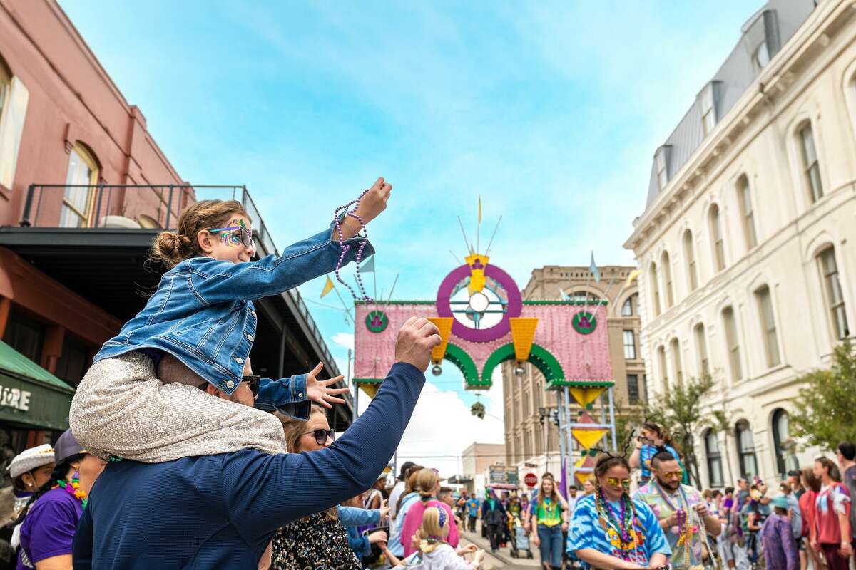 Thousands of islanders line the streets during Family Gras Sunday, which is always free to the public.