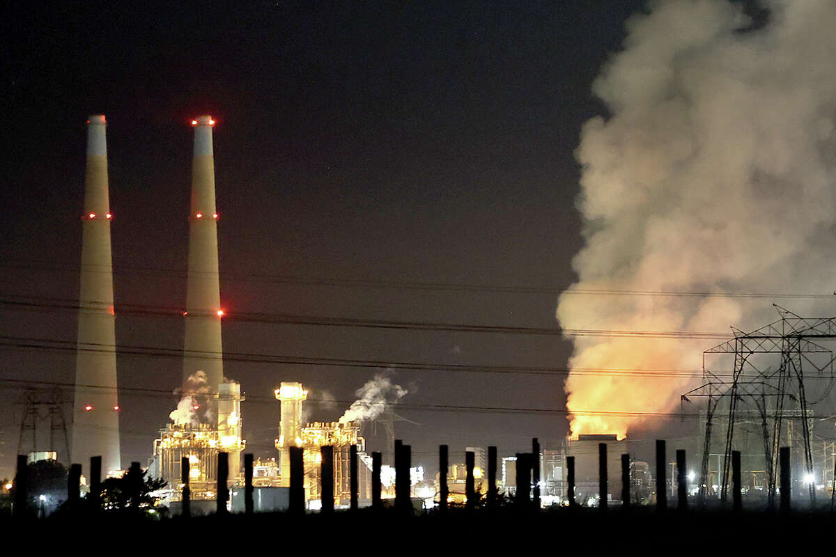 Flames and smoke from a fire fill the sky at the Moss Landing Power Plant Thursday Jan. 16, 2025 in Moss Landing, Calif.