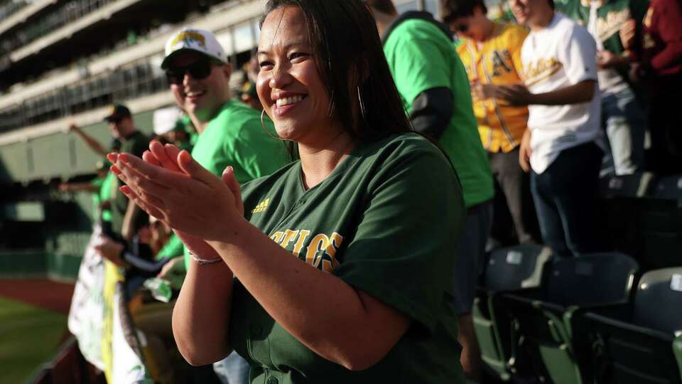 Oakland Mayor Sheng Thao watches Oakland Athletics play Tampa Bay Rays from the right field bleachers during Reverse Boycott game at Oakland Coliseum in Oakland, Calif. on Tuesday, June 13, 2023.