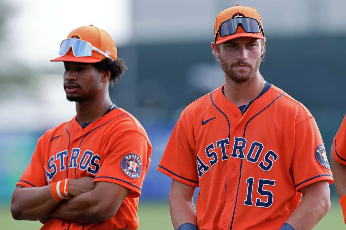 Houston Astros center fielder Jacob Melton (15) and shortstop Brice Matthews (2) look on during an MLB Spring Breakout game against the St. Louis Cardinals on March 17, 2024 at Roger Dean Chevrolet Stadium in Jupiter, Florida. 