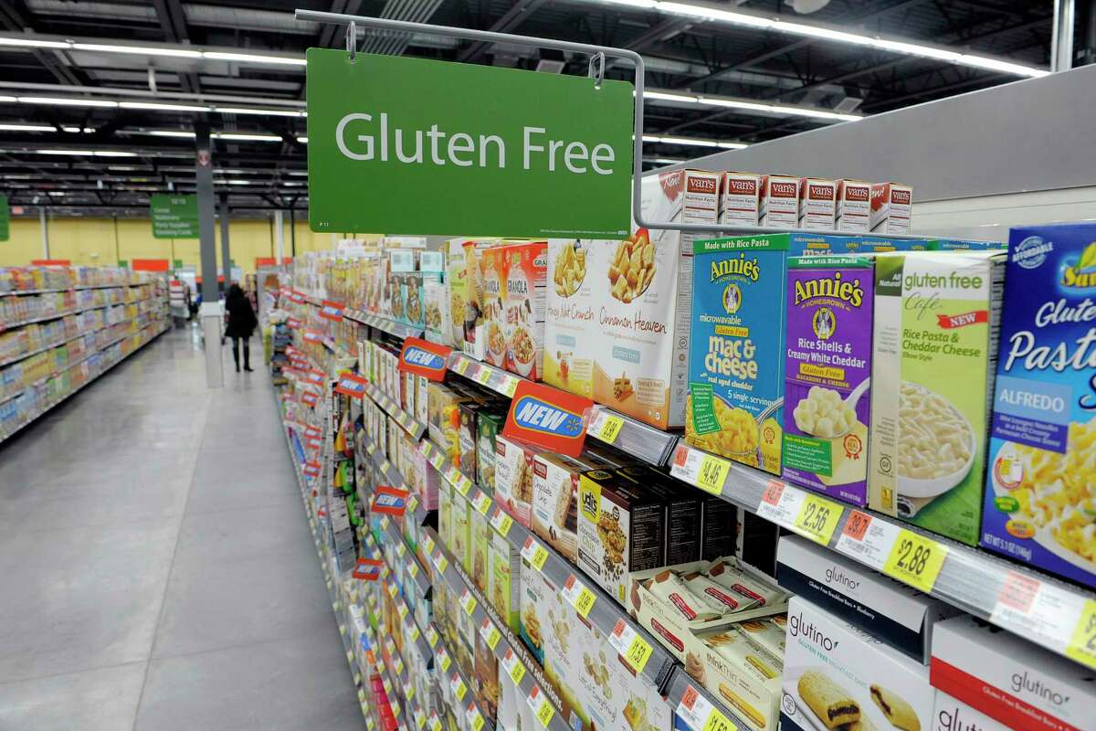 A view of the gluten free section as workers finish stocking the shelves at the Walmart Neighborhood Market on Thursday, Oct. 31, 2013 in Niskayuna, NY. The new grocery store opens tomorrow (Friday). (Paul Buckowski / Times Union)