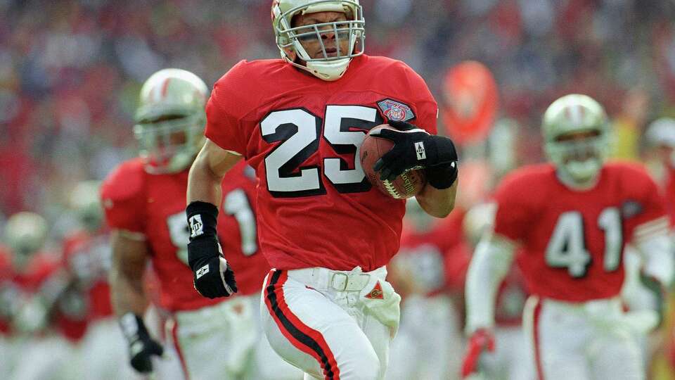 San Francisco 49ers' Eric Davis, runs into the end zone Sunday, Jan. 15, 1995, during first-quarter, NFC Championship action against the Dallas Cowboys, in San Francisco. Davis lead the 49ers' to a 31-14 halftime lead with two interceptions and a strip.