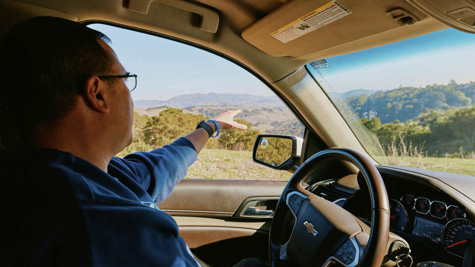 Moraga-Orinda Fire District Chief Jeff Isaacs drives along a network of remote rural fire roads above the community of Canyon near Moraga and Orinda in the East Bay, California.