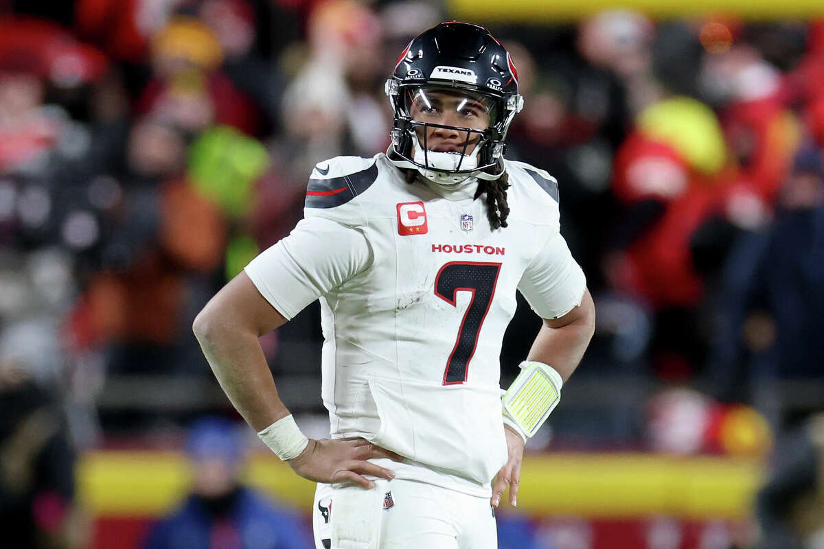 C.J. Stroud #7 of the Houston Texans walks off the field after being sacked against the Kansas City Chiefs during the fourth quarter in the AFC Divisional Playoff at GEHA Field at Arrowhead Stadium on January 18, 2025 in Kansas City, Missouri.