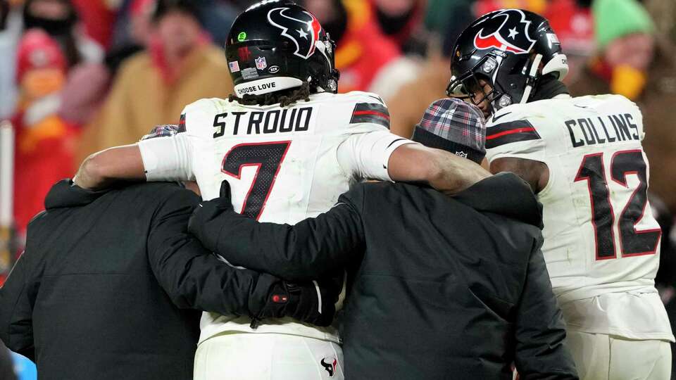 Houston Texans quarterback C.J. Stroud (7) is helped off the field during the second half of an AFC Divisional playoff football game, Saturday, Jan. 18, 2025, in Kansas City, Mo.