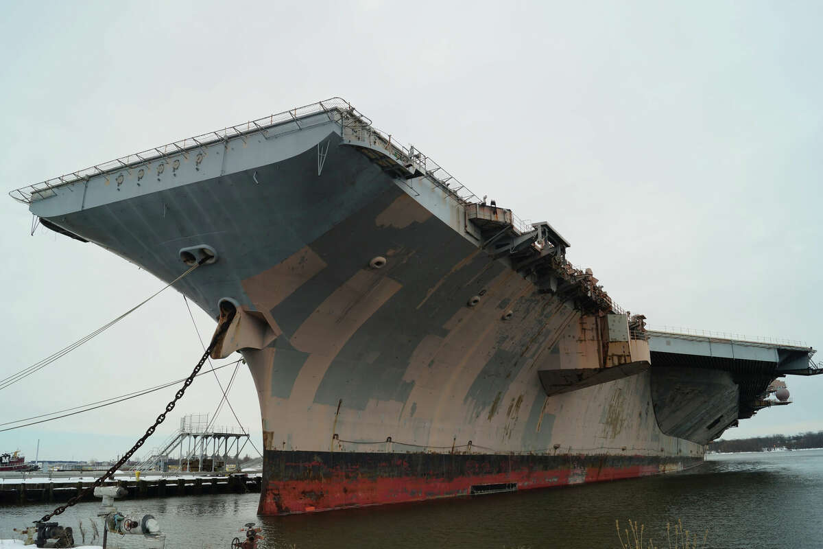 The USS John F. Kennedy aircraft carrier at the NAVSEA Inactive Ships On-site Maintenance facility in Philadelphia. The Kennedy is heading to Brownsville for dismantling.