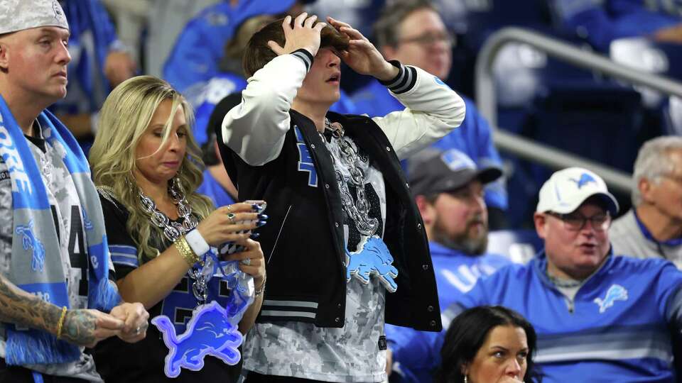 DETROIT, MICHIGAN - JANUARY 18: Detroit Lions fans react during the fourth quarter against the Washington Commanders in the NFC Divisional Playoff at Ford Field on January 18, 2025 in Detroit, Michigan. Washington defeated Detroit 45-31.