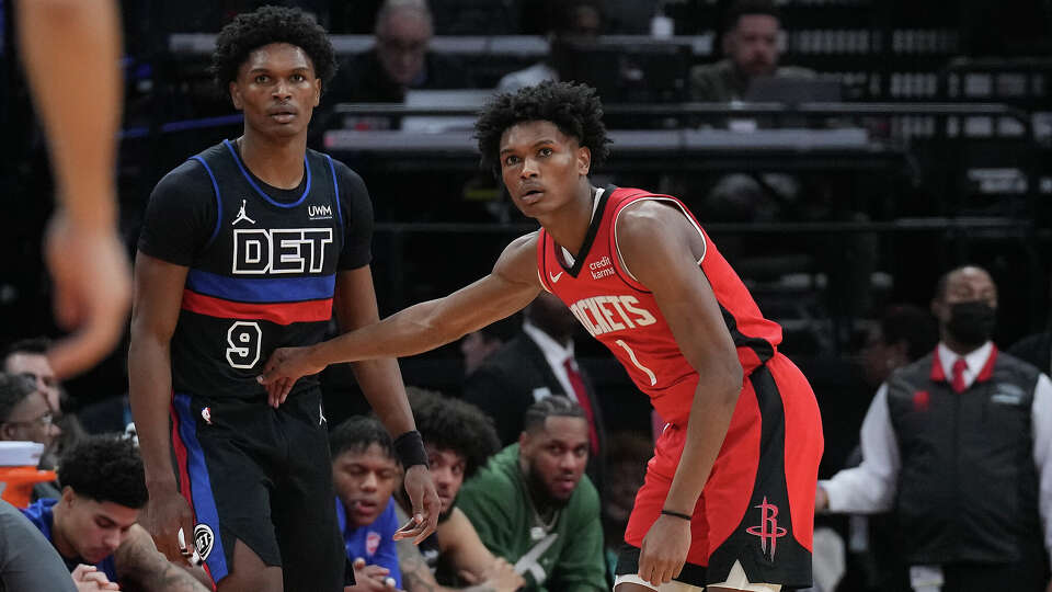 Detroit Pistons forward Ausar Thompson (9) is defended by his twin brother Houston Rockets forward Amen Thompson (1) in the second half of NBA game action at the Toyota Center on Monday, Jan. 1, 2024 in Houston. Houston Rockets won the game 136-113.