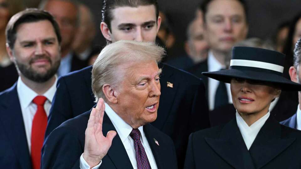 President-elect Donald Trump takes the oath of office during the 60th Presidential Inauguration in the Rotunda of the U.S. Capitol in Washington, Monday, Jan. 20, 2025. (Saul Loeb/Pool photo via AP)