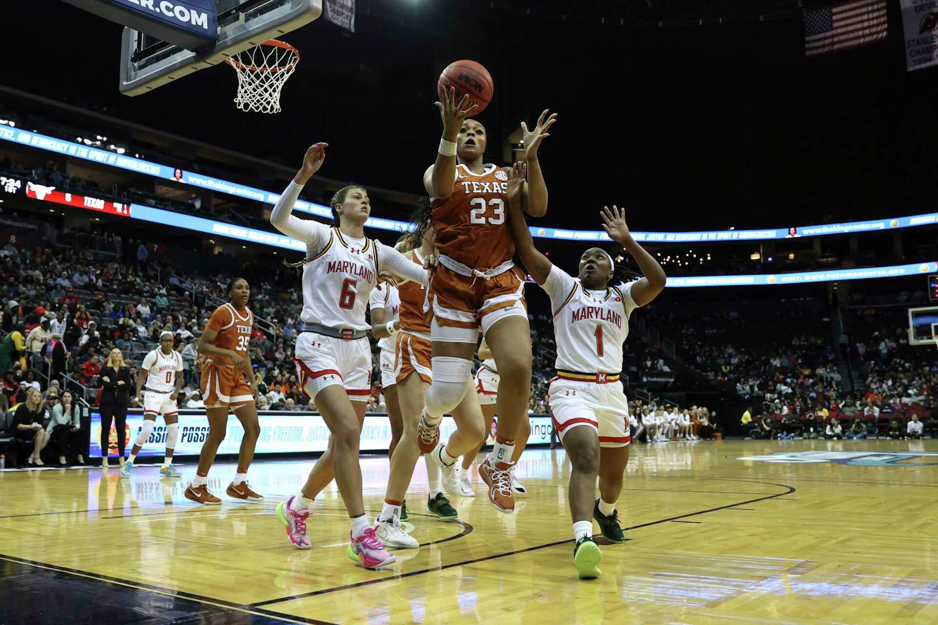 Madison Booker helps No. 7 Texas rout No. 8 Maryland 8951 in inaugural