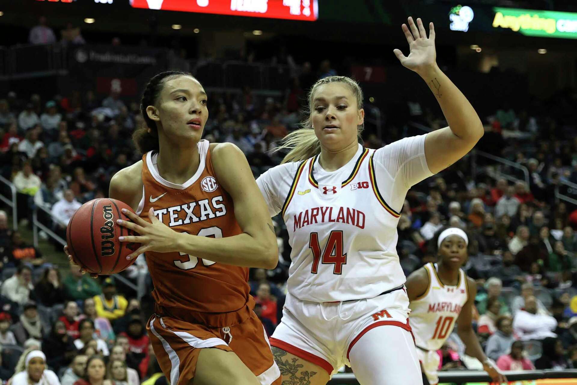 Madison Booker helps No. 7 Texas rout No. 8 Maryland 8951 in inaugural