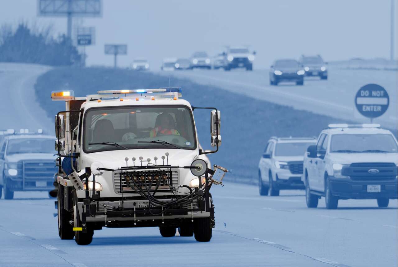 A TxDOT truck used to apply a brine solution to help prevent ice from sticking on roads is shown along the feeder road of SH249 near FM1960 Monday, Jan. 20, 2025, in Houston.