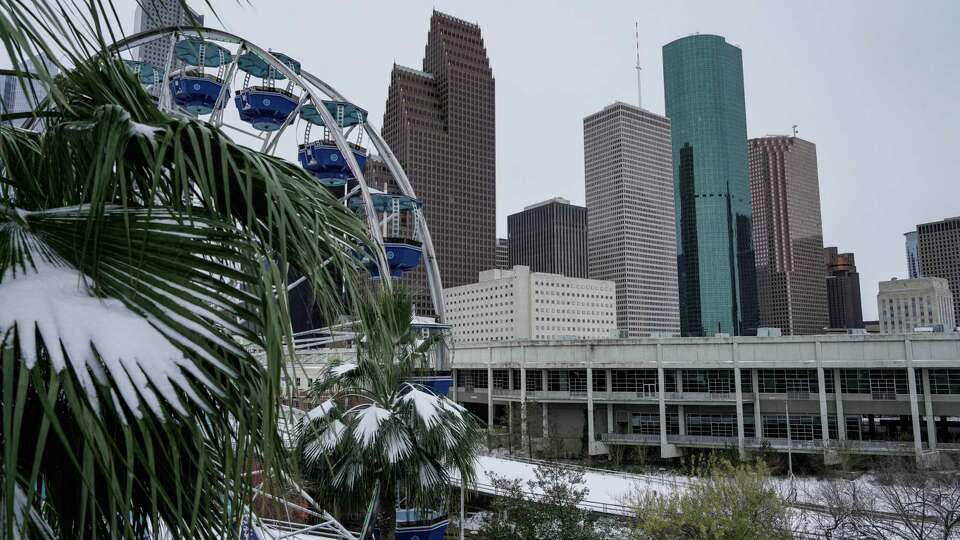 Snow is seen through out Downtown Houston during a winter storm on Tuesday, Jan. 21, 2025 .