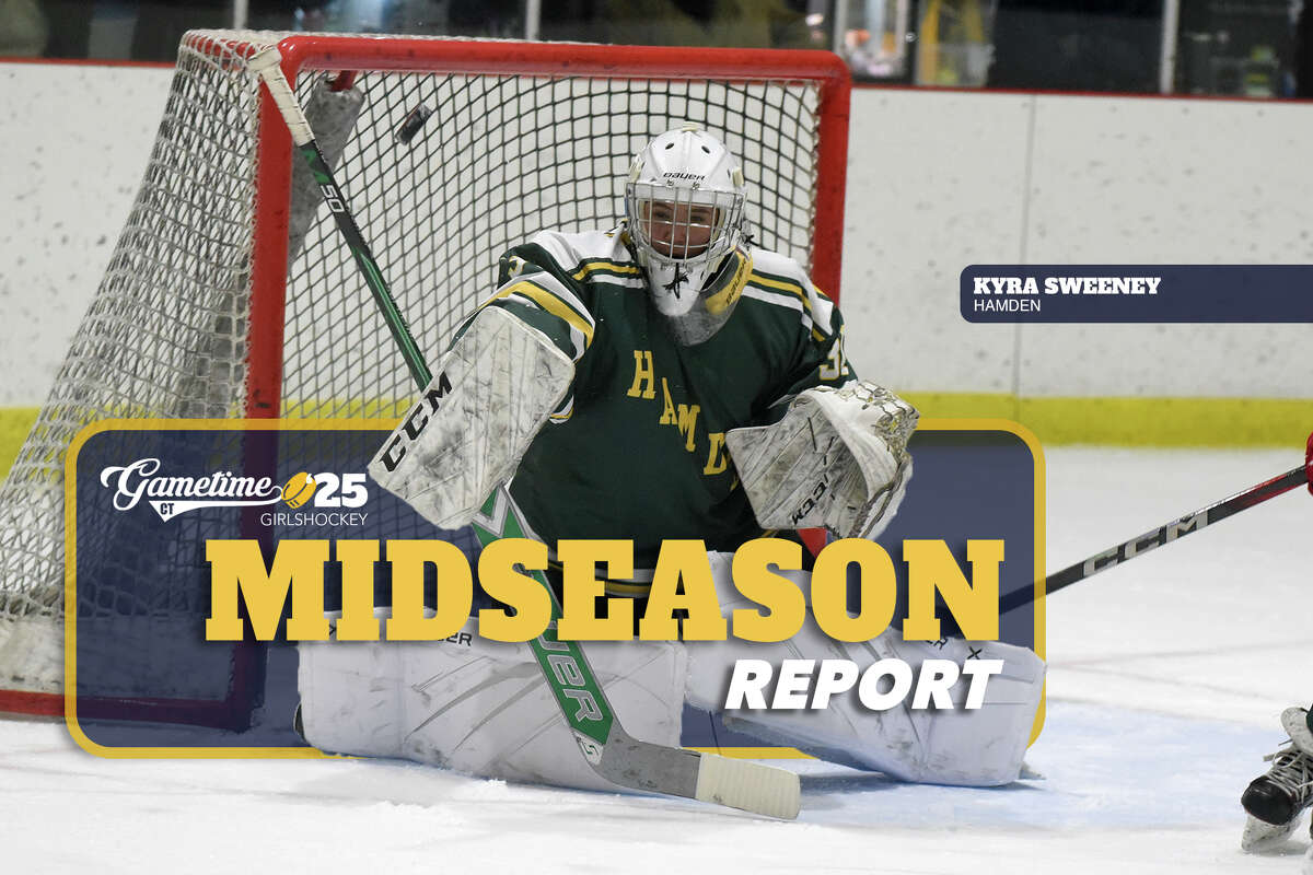 Hamden goalie Kyra Sweeney knocks the puck away for one of her 52 saves against New Canaan during a girls ice hockey game in Darien on Wednesday, Jan. 8, 2025.