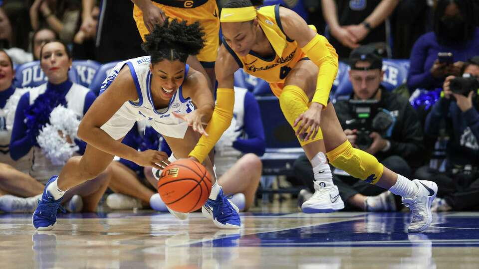 DURHAM, NC - JANUARY 16: Duke Blue Devils guard Ashlon Jackson (3) and California Golden Bears guard Kayla Williams (4) go after the loose ball during the college basketball game between the Duke Blue Devils and the California Golden Bears on January 16, 2025 at Cameron Indoor Stadium in Durham, NC.