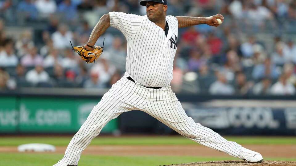 FILE - New York Yankees starting pitcher CC Sabathia throws during the fourth inning of the team's baseball game against the Tampa Bay Rays, July 16, 2019, in New York. (AP Photo/Kathy Willens, file)