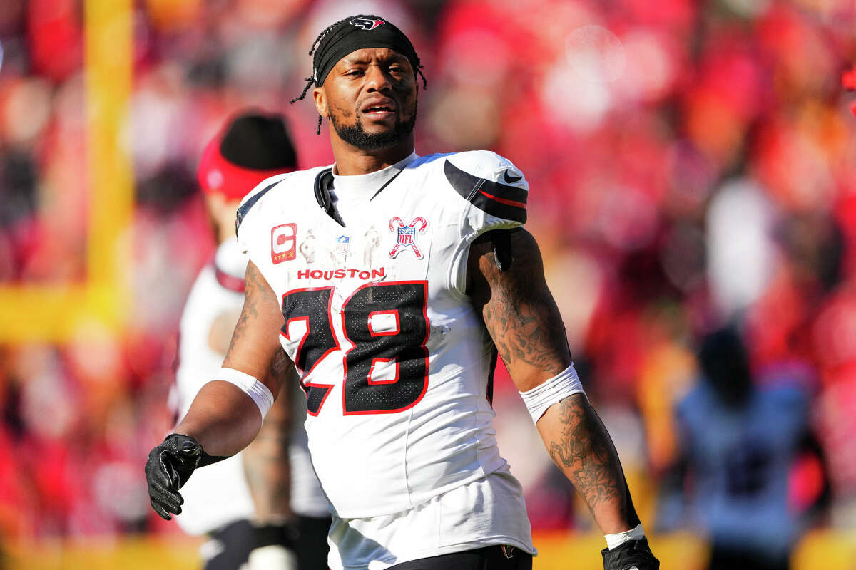 KANSAS CITY, MO - DECEMBER 21: Joe Mixon #28 of the Houston Texans looks on from the field during an NFL football game against the Kansas City Chiefs at GEHA Field at Arrowhead Stadium on December 21, 2024 in Kansas City, Missouri. (Photo by Cooper Neill/Getty Images)