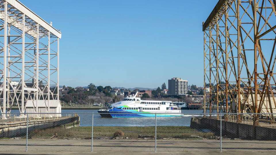 An SF Bay Ferry boat crosses the Napa River to the Mare Island ferry terminal in Vallejo, Calif., on Tuesday, Jan. 21, 2025.