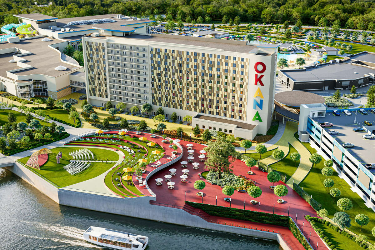 A rendering of the OKANA Resort & Indoor Waterpark in Oklahoma City. At foreground is an ampitheater and seating, plus the main hotel and parking garages.