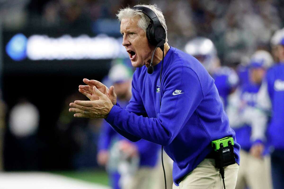 FILE - Seattle Seahawks head coach Pete Carroll watches play in the first half of an NFL football game against the Dallas Cowboys in Arlington, Texas, Thursday, Nov. 30, 2023.