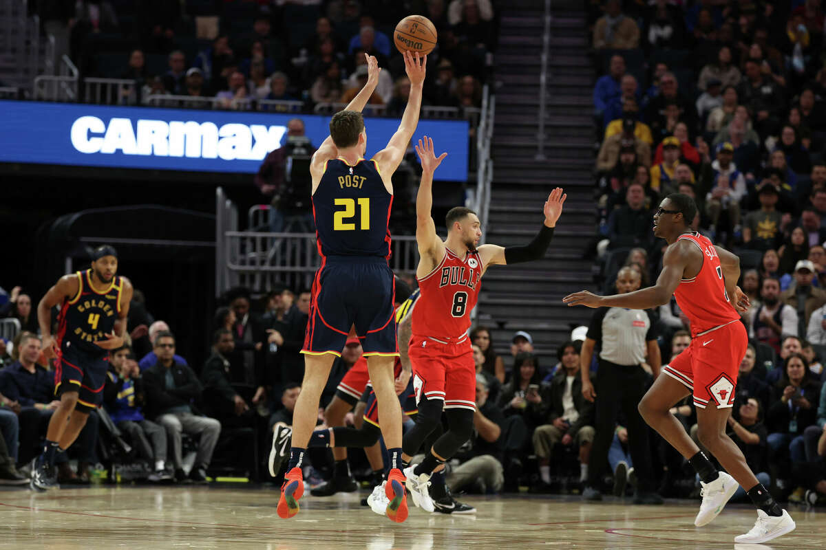 Golden State Warriors center Quinten Post shoots against Chicago Bulls guard Zach LaVine during the second half of an NBA basketball game in San Francisco, Thursday, Jan. 23, 2025.