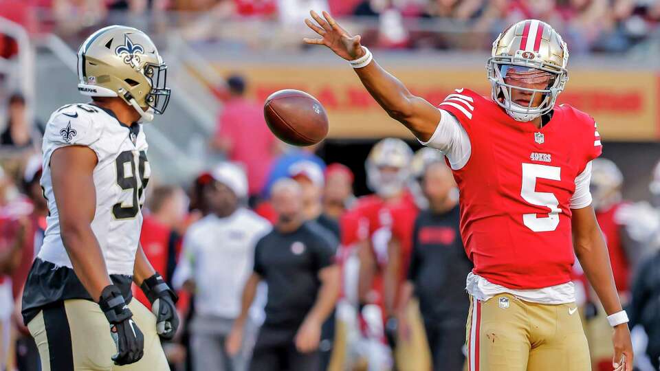 Josh Dobbs (5) drops the ball after scrambling for a first down in the first half as the San Francisco 49ers played the New Orleans Saints in a preseason game at Levi’s Stadium in Santa Clara, Calif., on Sunday, Aug. 18, 2024.