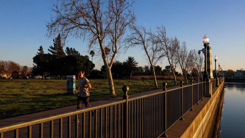 A runner exercises at Mike Day Memorial Park in Suisun, Calif. on Thursday, January 23, 2025. Suisun City is exploring annexing land to the east or west of town, including some property owned by California Forever.