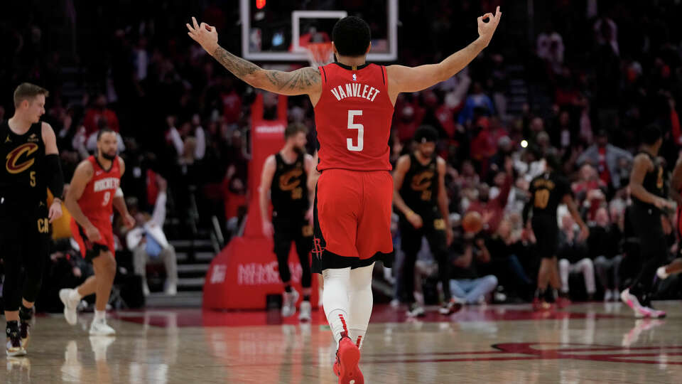 Houston Rockets guard Fred VanVleet (5) celebrates after making a 3-pointer during the second half of an NBA basketball game against the Cleveland Cavaliers in Houston, Wednesday, Jan. 22, 2025. (AP Photo/Ashley Landis)