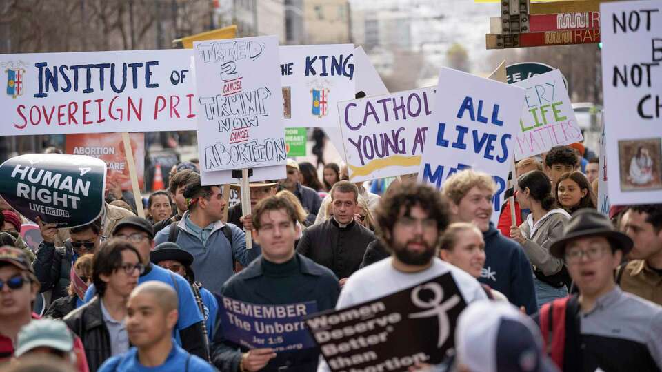 Hundreds of marchers make their way to the Embarcadero during the 21st Annual West Coast Walk for Life in downtown San Francisco on Saturday, Jan. 25, 2025.