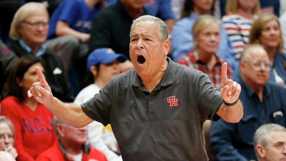 Houston head coach Kelvin Sampson reacts during the first half of an NCAA college basketball game against Kansas, Saturday, Jan. 25, 2025, in Lawrence, Kan. (AP Photo/Colin E. Braley)