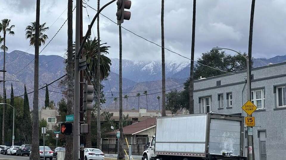 Snowl dusts the San Gabriel Mountains, as seen Sunday from Pasadena City College.