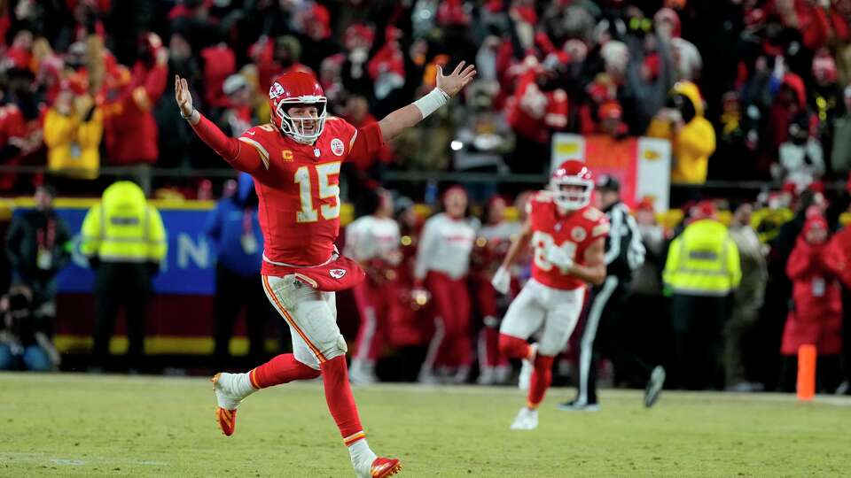 Kansas City Chiefs quarterback Patrick Mahomes (15) celebrates after defeating the Buffalo Bills in the AFC Championship NFL football game, Sunday, Jan. 26, 2025, in Kansas City, Mo.