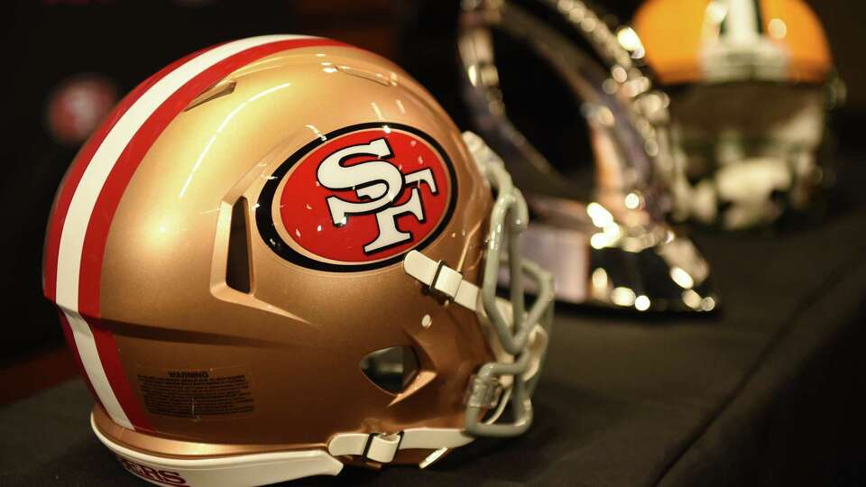 Helmets of both teams flank the NFC Championship Trophy on display before a press conference at Levi's Stadium, where the San Francisco 49ers will host the NFC Championship Game against the Green Bay Packers Sunday, on January 16, 2020 in Santa Clara, CA.