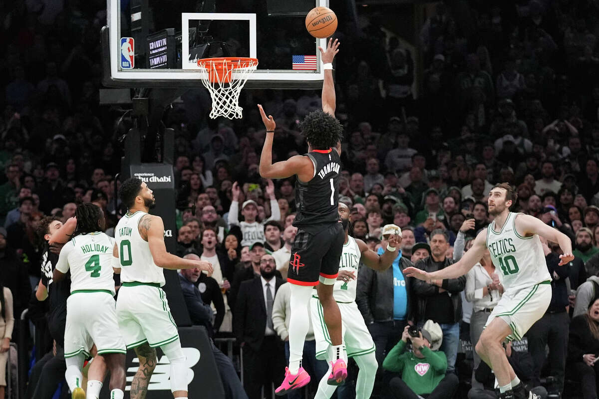 Houston Rockets forward Amen Thompson (1) makes the winning shot against the Boston Celtics during the final seconds of an NBA basketball game, Monday, Jan. 27, 2025, in Boston. 