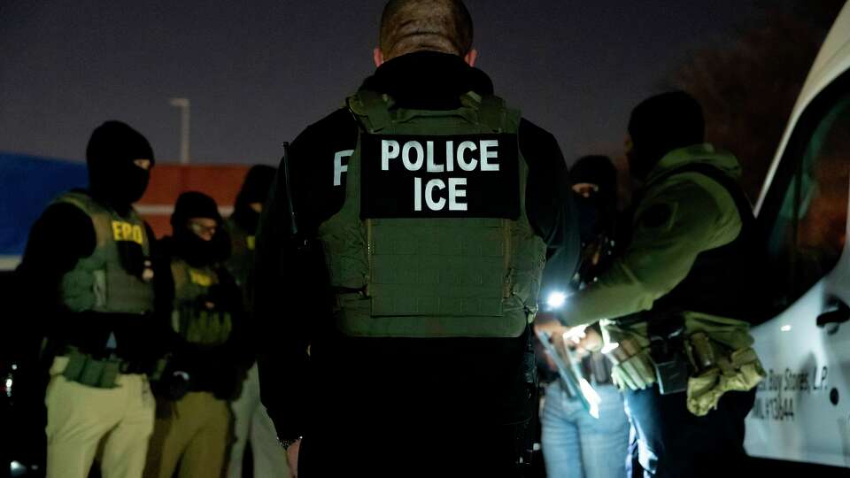 U.S. Immigration and Customs Enforcement officers gather for a briefing. In San Antonio, ICE and other federal agencies conducted 'targeted enforcement operations' on Sunday.