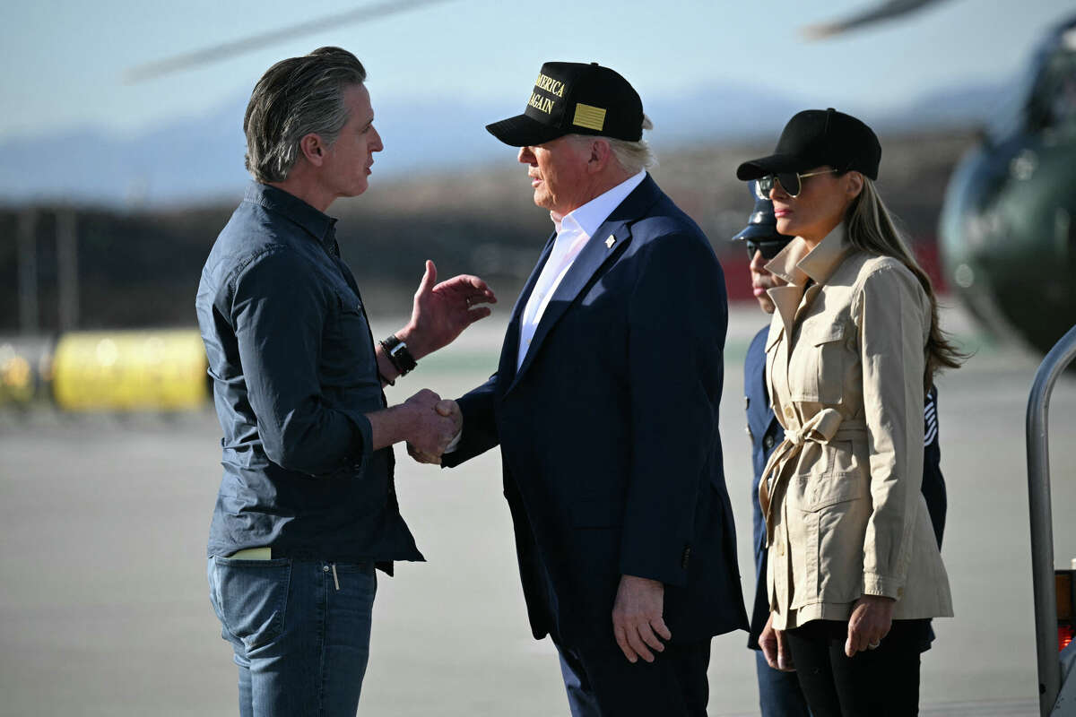 U.S. President Donald Trump shakes hands with California Gov. Gavin Newsom upon arrival in Los Angeles, California, on January 24, 2025, to visit the region devastated by the Palisades and Eaton fires.