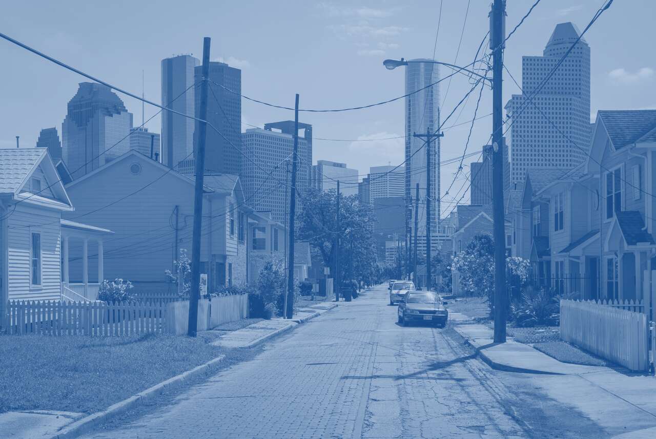 Old brick streets are juxtaposed among newly built town homes along Andrews Street in the Freedmen's Town neighborhood Tuesday, April 30, 2013, in Houston.