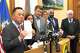 Connecticut Attorney General William Tong holds up a copy of the Trump administration memo that seeks to freeze large amounts of federal funding. Tong called the policy "utterly unconstitutional and unlawful."