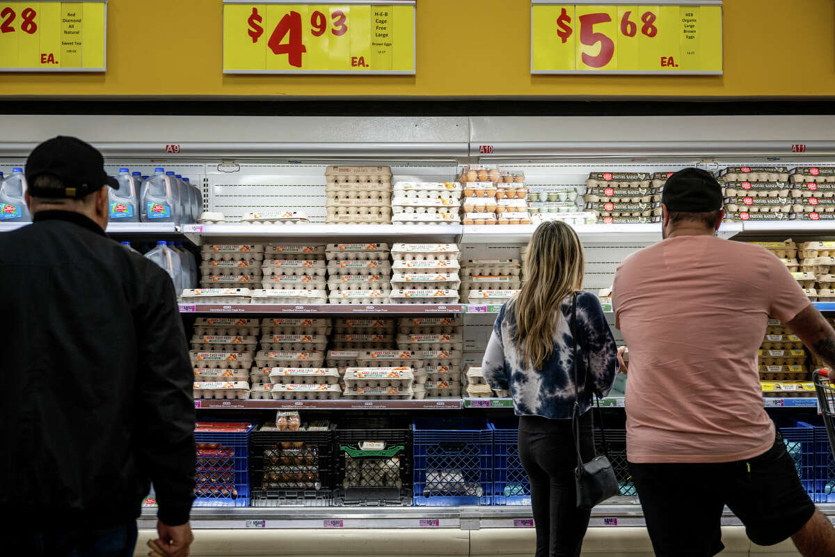 Customers shop for eggs at a H-E-B grocery store on February 08, 2023 in Austin, Texas. 