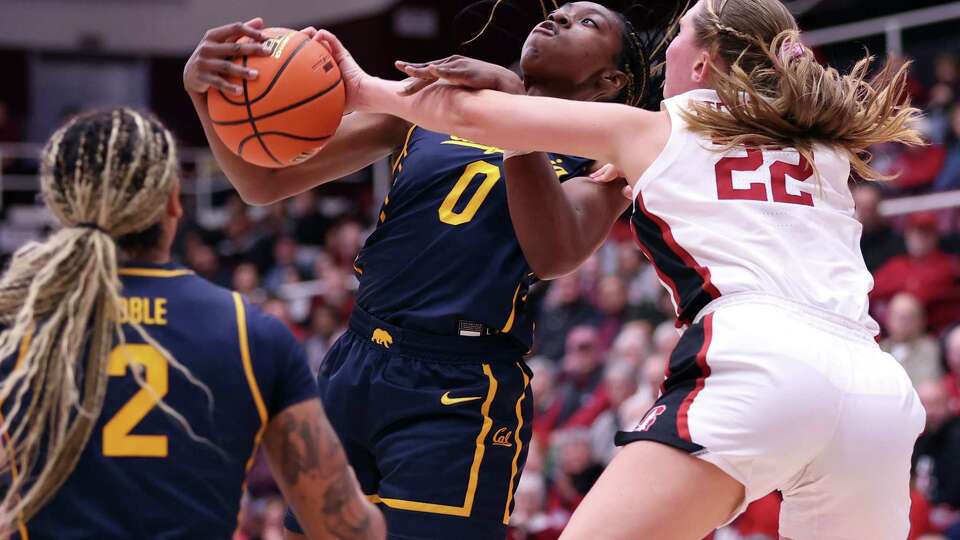 Cal’s Michelle Onyiah garbs a rebound away from Stanford’s Mary Ashley Stevenson in 4th quarter of Golden Bears’ 75-72 win in ACC women’s basketball game at Maples Pavilion in Stanford, Calif., on Thursday, January 23, 2025.