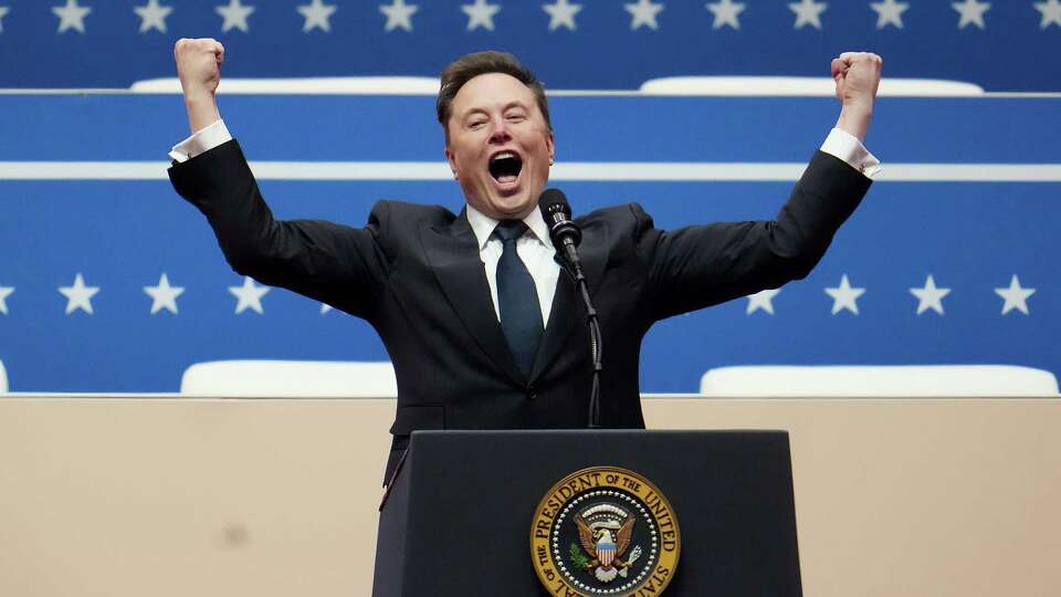 WASHINGTON, DC - JANUARY 20: Tesla, SpaceX and X CEO Elon Musk arrives to speak during an inauguration event at Capital One Arena on January 20, 2025 in Washington, DC. Donald Trump takes office for his second term as the 47th president of the United States. (Photo by Christopher Furlong/Getty Images) *** BESTPIX ***